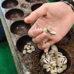 Menghidupkan Kembali Pesona Main Congklak Tradisional
